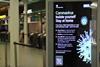 A coronavirus information sign at King's Cross railway station