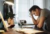 Stressed man working from home