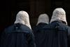 Judges wearing wigs and gowns