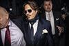 Johnny Depp leaving the High Court, Royal Courts Of Justice where he is suing the British tabloid newspaper The Sun
