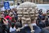 Barristers and solicitors protest in a second mass walkout over cuts to legal aid, Westminster