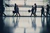 Office workers leave the office