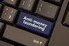 Anti-money laundering button on computer keyboard
