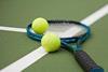 Tennis racquet and balls