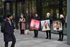 Lawyers and campaigners staged a climate protest outside the London offices of A&O Shearman and Akin