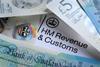 HMRC letterhead surrounded by cash