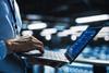 Office worker typing on laptop