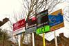 Estate agents' for sale and property letting signs, Muswell Hill, London