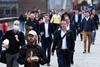 Office workers walking across London Bridge during Covid