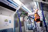 A Victoria line train is sprayed with an antiviral coating at Northumberland Park depot during the COVID-19 outbreak