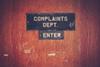 Complaints department sign