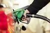 Pumping petrol into a car