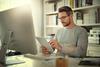 Man working on tablet at desk