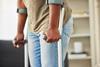 Anonymous person on crutches