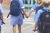 Primary school children walking to school