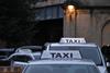 Taxis queuing at a taxi rank