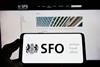 Serious Fraud Office logo displayed on phone screen