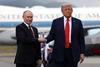 Russian President Vladimir Putin and US President Donald Trump shake hands in Alaska