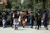 Taliban fighters patrol in the Wazir Akbar Khan neighborhood in the city of Kabul, Afghanistan