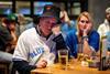 A Toronto Blue Jays fan reacts in a bar after the LA Dodgers defeated the Blue Jays in Game 7 of baseball's World Series. Vancouver, British Columbia, 1 November 2025