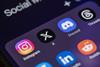 Instagram, X and various other apps displayed on a phone screen