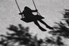 Anonymous child on a swing