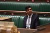 Rishi Sunak sits in the House of Commons before delivering his budget statement