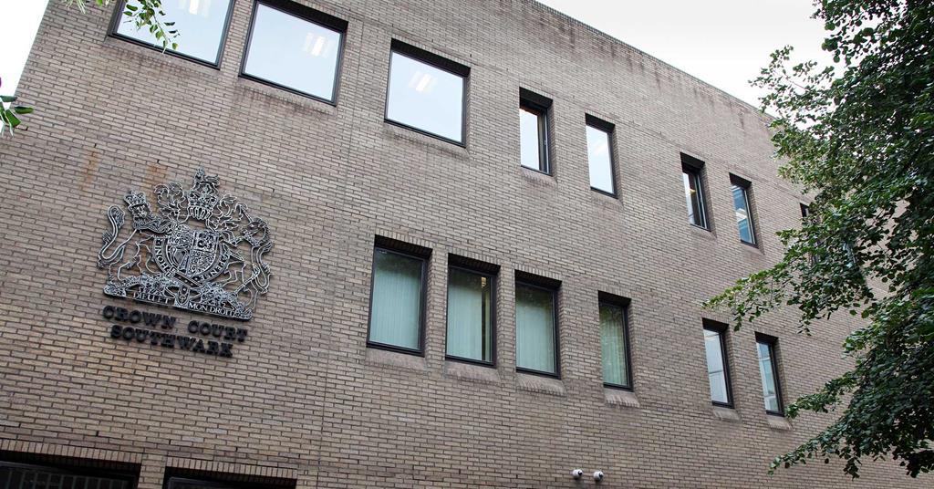 Solicitor accused of insider dealing appears in court