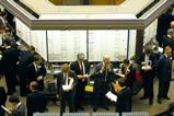 Brokers on the old trading floor of the London Stock Exchange, a few days before its replacement by the Stock Exchange Automated Quotation system, October 1986
