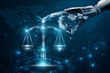 Robot hand touches justice scales