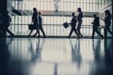 Office workers leave the office