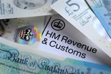 HMRC letterhead surrounded by cash