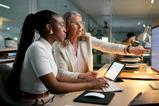 Office trainee works alongside her mentor