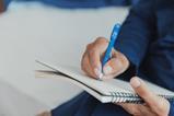 Journalist taking notes