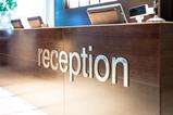 Reception desk in office lobby