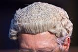 Anonymous man wearing barrister wig