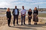 Beach break: staff from Boys & Maughan Solicitors’ Margate office enjoying a lunchtime walk to Margate Main Sands
