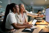 Office trainee works alongside her mentor