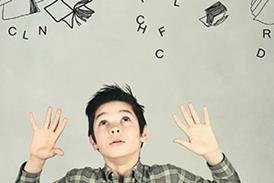 boy looking at numbers 300x207