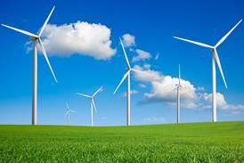 Wind turbines in field