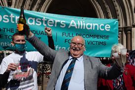 Tom Hedges opens a bottle of Prosecco after his conviction was quashed