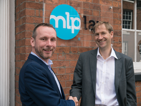 MLP Law's managing director, Stephen Attree welcomes William H Lill partner Seb Jackson (right) 