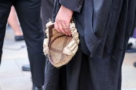 Barrister holds wig