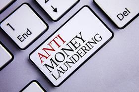 Anti-money laundering button on laptop keyboard
