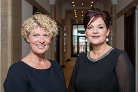 Rachel and Linda black dress top corridor