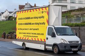 Covid-warning-truck-advert