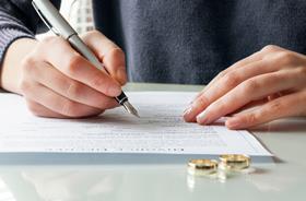 Divorce decree signing / wedding rings