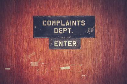 Complaints department sign