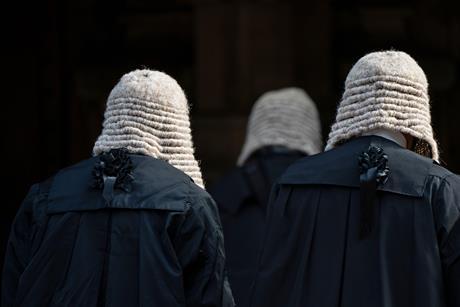 Judges wearing wigs and gowns