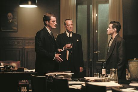 On brand: Richard E Grant (right) as barrister Sir David Maxwell Fyfe KC in the film Nuremberg